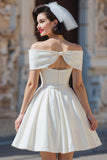 Vestido de novia corto de raso blanco con lazos