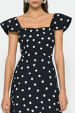 Vestido de mangas de lunares en blanco y negro línea A
