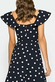 Vestido de mangas de lunares en blanco y negro línea A