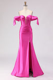 Vestido largo de graduación con corsé fucsia y cuentas y abertura