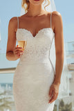 Vestido largo de novia de tirantes finos de marfil