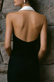 Vestido de compromiso blanco y negro con hentre con funda arrugada