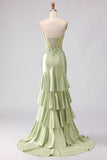 Vestido de fiesta sirena verde claro con volantes y corsé de encaje en la espalda