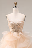 Vestido largo de graduación de organza sin tirantes de champán con volantes