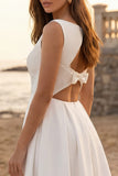 Vestido de compromiso midi de cuello bateau de marfil con apliques
