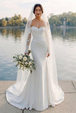 Vestido de novia de cola de sirena de satén de marfil con mangas