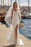 Vestido largo de novia largo de tirantes en línea A de marfil con encaje aplicado y abertura