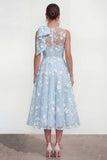 Vestido midi rosa floral con arco y cuello redondo, bolsillos