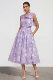 Vestido midi rosa floral con arco y cuello redondo, bolsillos