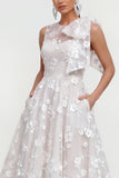 Vestido midi rosa floral con arco y cuello redondo, bolsillos