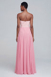 Vestido formal largo de franzos rosa sin tirantes