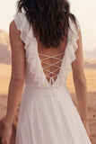 Vestido de novia de playa con volantes Maxi Marfil y escote en V y abertura