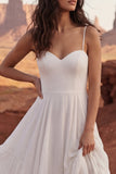 Vestido de novia largo bohemio con volantes y abertura en línea A de marfil