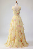 Vestido largo largo de graduación amarillo floral con escote en V y volantes y lazo