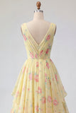 Vestido largo largo de graduación amarillo floral con escote en V y volantes y lazo