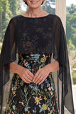 Vestido largo de Madre de la Novia bordado en tul negro con capa