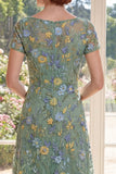 Vestido de Madre de la Novia bordado con escote bateau de tul verde línea A
