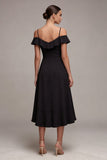 Vestido negro A de hombro frío con volantes