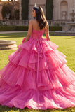 Vestido de gala Quinceañera con volantes fucsia con lazos