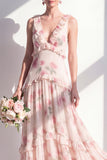 Vestido largo de dama de honor floral de albaricoque, escote en V y gasa en pico
