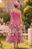 Vestido largo de madre de la novia fucsia de un hombro floral con lazo
