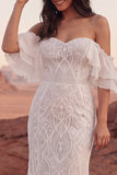 Vestido de novia sirena bohemio de encaje marfil descubierto