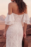 Vestido de novia sirena bohemio de encaje marfil descubierto