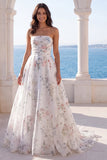 Vestido de novia floral sin tirantes en marfil con cola capilla