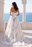 Vestido de novia floral sin tirantes en marfil con cola capilla