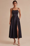 Vestido largo de corbata negra con tirantes finos y bolsillos