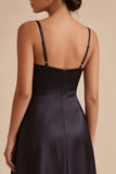 Vestido largo de corbata negra con tirantes finos y bolsillos