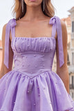 Vestido de bienvenida a casa con perlas lilas y cuento de hadas con capas en la espalda