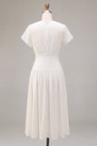 Vestido blanco pequeño de gasa de línea A con escote en V