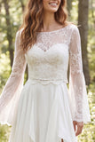 Vestido de novia de manga larga con volantes y gasa de marfil y abertura