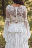 Vestido de novia largo de marfil con escote en A y volantes con abertura