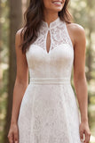 Vestido de novia de encaje marfil largo con abertura en línea A con halter.