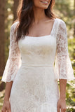 Vestido de novia largo de encaje marfil de línea A de 3/4 mangas con abertura