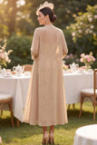 Vestido de madre de la novia bordado con lentejuelas de champán y chifón