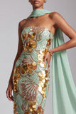 Vestido largo de graduación sin tirantes dorados con lentejuelas y chiffon