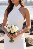 Mini vestido de novia de tul blanco con funda con capçalera