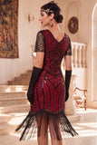 Vestido negro de los años 20 con flecos de manga corta y escote en V y lentejuelas