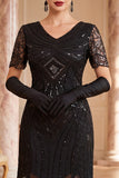 Vestido negro de los años 20 con flecos de manga corta y escote en V y lentejuelas