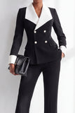Traje de mujer blanco y negro con solapa cruzada, doble botonadura y bolsillos