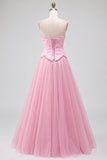 Vestido largo de fiesta rosa de tul bordado con cuentas, sin tirantes y corte A