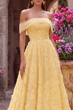 Vestido largo de fiesta amarillo con perlas, bordado floral, corte en línea A y hombros descubiertos