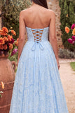 Vestido largo de fiesta azul con flores, cuentas, sin tirantes y abertura
