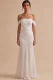 Vestido largo de tul con cuentas y sirena blanca sobre el hombro