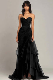 Vestido negro con volantes fruncidos