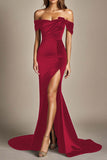 Vestido formal negro sirena con hombros descubiertos y abertura