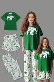Pijamas familiares de manga corta estampados en verde oscuro a juego